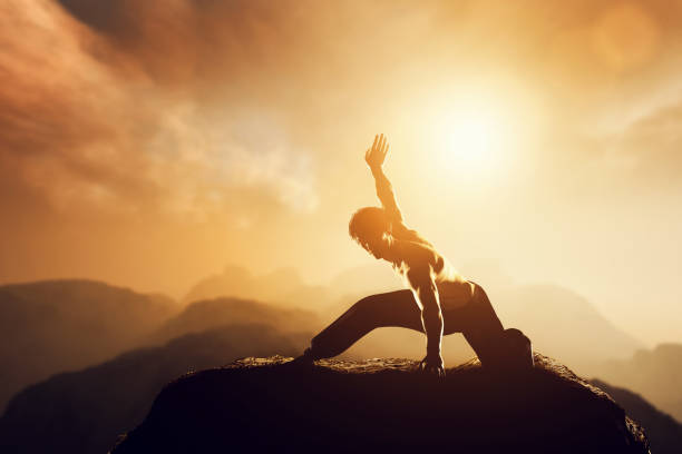 Asian man, fighter practices martial arts in high mountains at sunset. Asian man, fighter practices martial arts in high mountains at sunset. Kung fu and karate pose. Also concepts of discipline, concentration, meditaion etc. Unique kungfu stock pictures, royalty-free photos & images